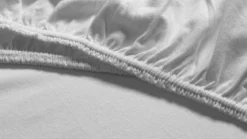 Snoozing jersey stretch topper hoeslaken