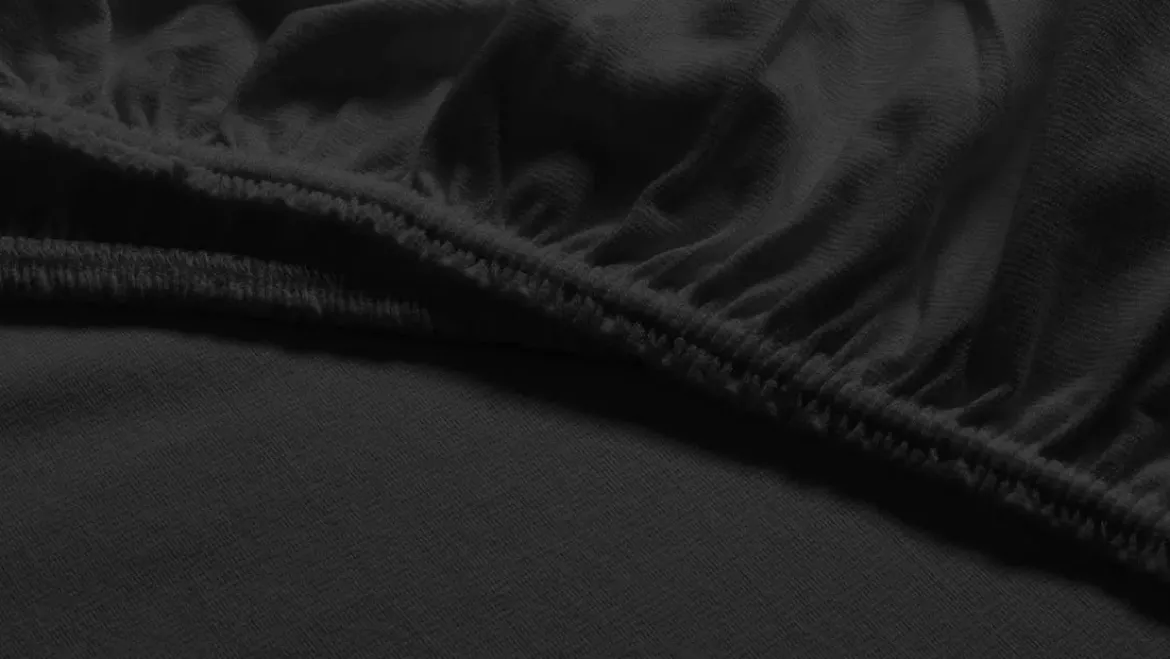 Snoozing jersey stretch topper hoeslaken