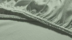 Snoozing jersey stretch topper hoeslaken