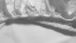 Snoozing percale katoen topper hoeslaken
