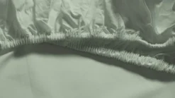 Snoozing percale katoen topper hoeslaken