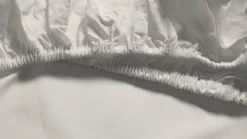 Snoozing percale katoen topper hoeslaken